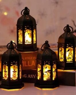 Ensemble de lanternes bougie lumineuses posées sur des livres, ambiance chaleureuse et décorative, idéal pour boutique Diproclean.