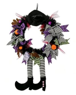 Couronne de Halloween avec rubans violets noirs et motifs rayés, élément décoratif.