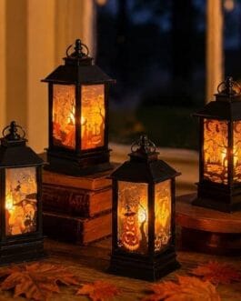 Lanterne lumineuse décorative au design Halloween avec motifs fantaisie sur socle sombre, ambiance chaleureuse et festive.